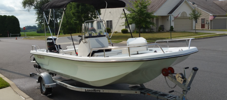 Sundance Skiff with Bimini Top & Hand Rails